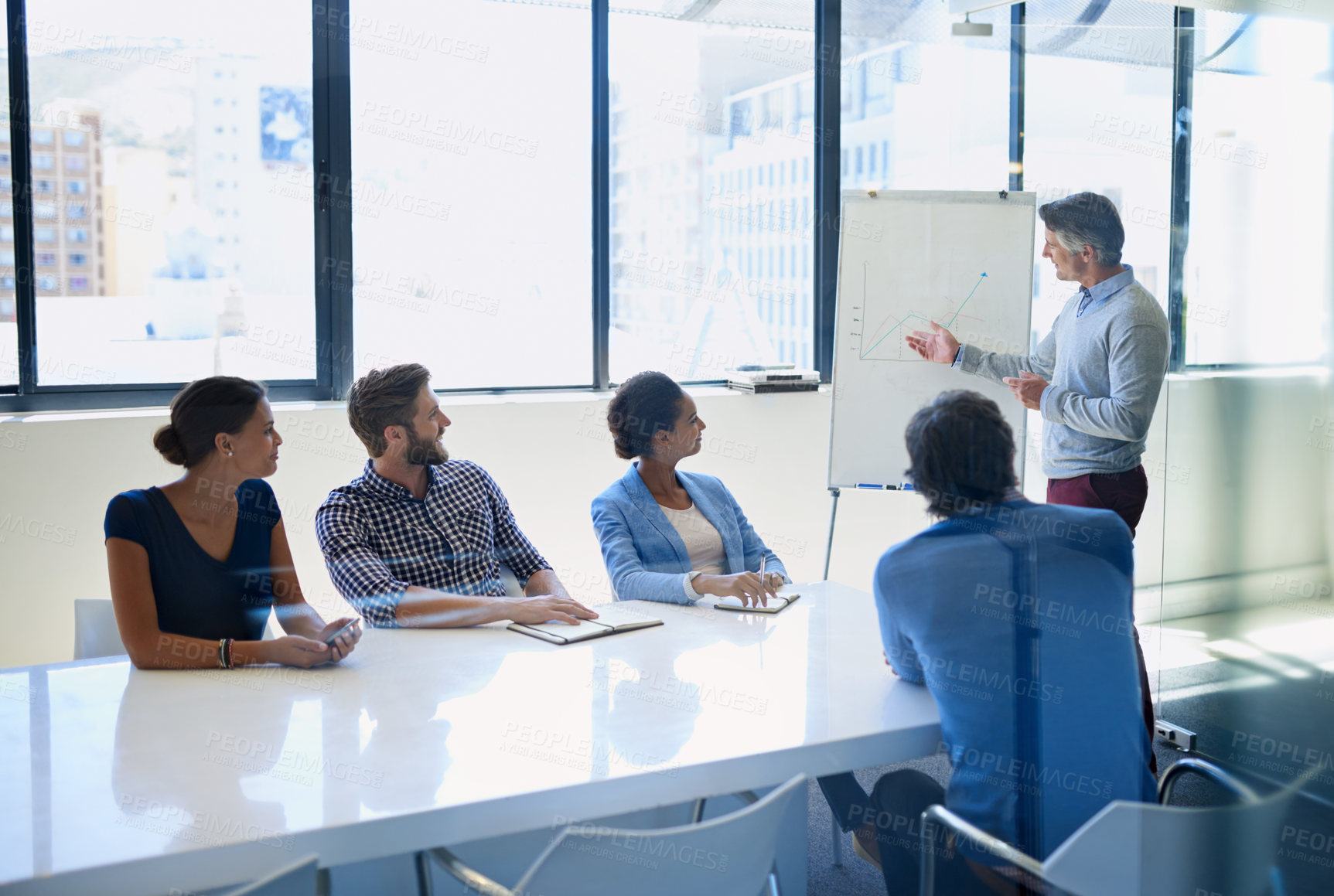 Buy stock photo Business, man and presentation with statistics on whiteboard at office for report and company growth. Employees, people and boardroom on meeting with feedback, review and analysis on revenue