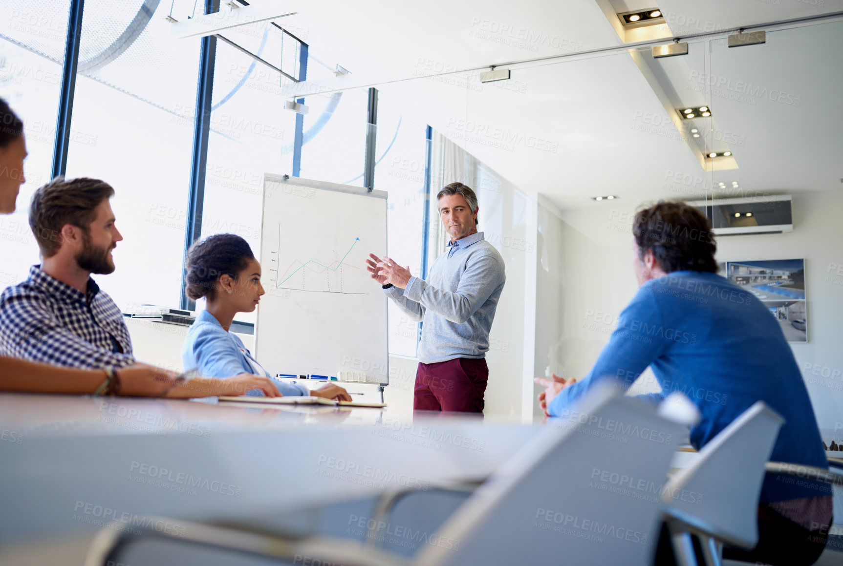 Buy stock photo Business, man and presentation with graphs on whiteboard at office for report and company growth. Employees, people and boardroom on meeting with feedback, review and statistics on revenue