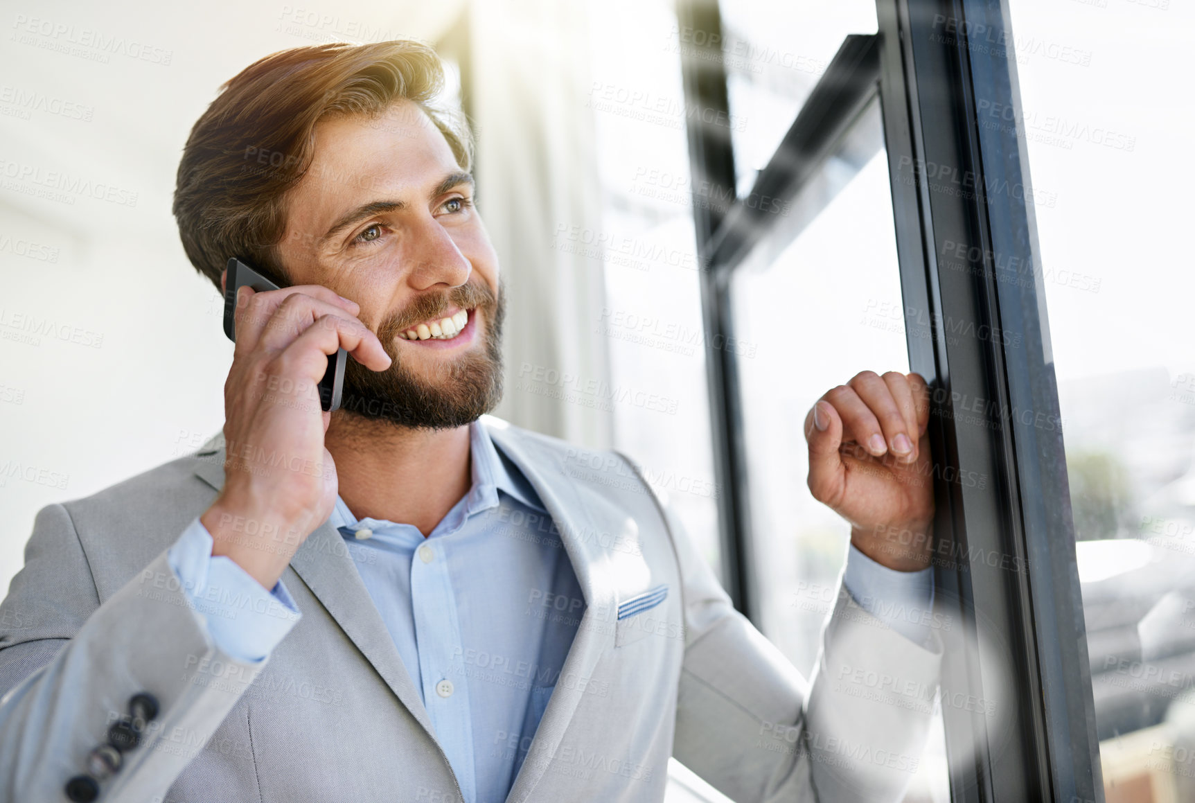 Buy stock photo Happy, businessman or window with phone call for communication, negotiation or proposal at office. Man, employee or agent with smile on mobile smartphone for business discussion, conversation or chat