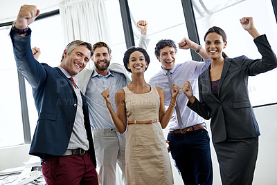 Buy stock photo Portrait of a group of business colleagues celebrating their success together