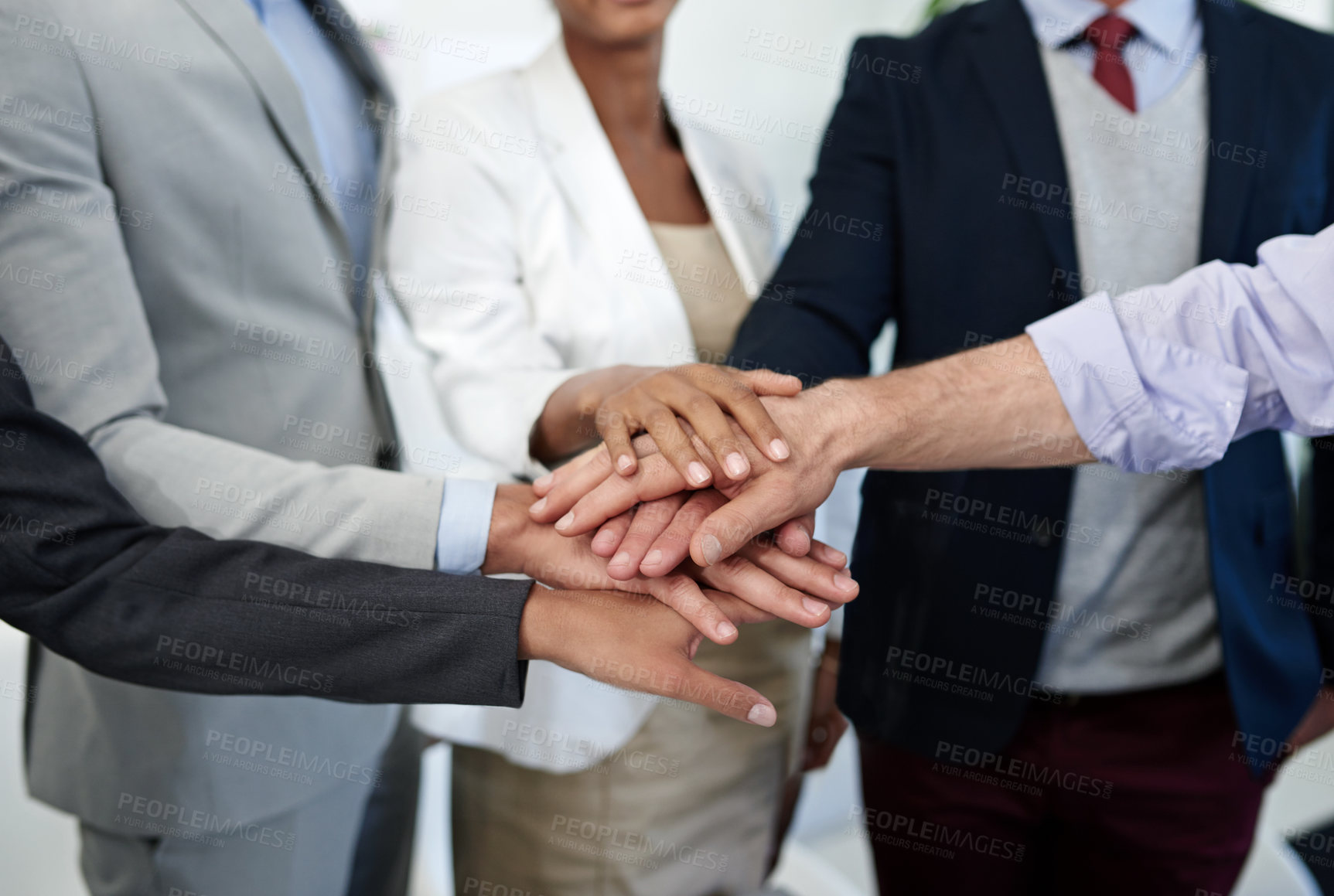 Buy stock photo Business people, hands together and meeting with team for synergy, mission or collaboration at office. Closeup, group or employees piling with stack for huddle, unity or solidarity at workplace