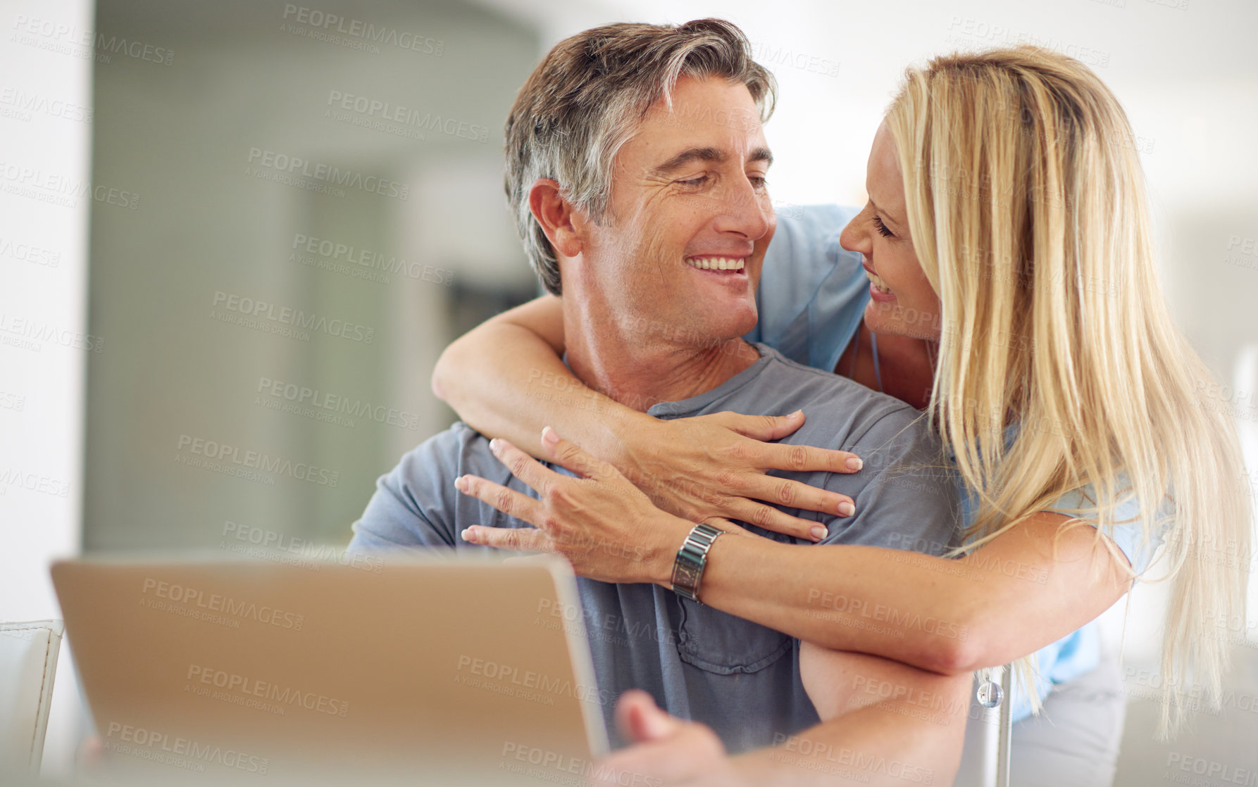 Buy stock photo Home, mature couple and connection with laptop for insurance cover, online research or information. House, woman and man with technology for investment, financial review or happy for support with hug