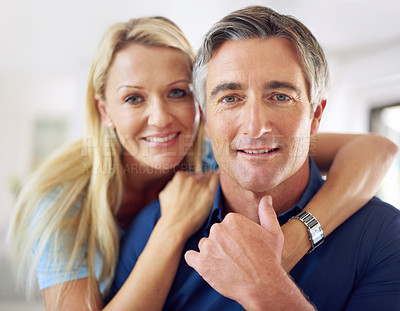 Buy stock photo Portrait of an affectionate mature couple at home