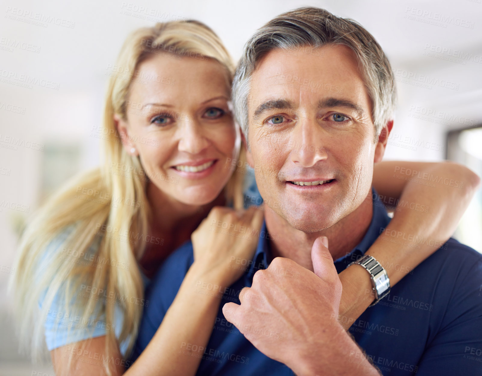 Buy stock photo Portrait of an affectionate mature couple at home