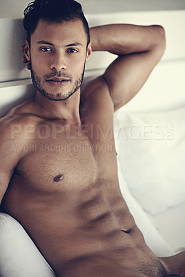 Buy stock photo Shot of a handsome naked man in bed in the morning