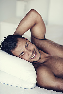 Buy stock photo Portrait, happy and morning with a sexy man in bed, shirtless after a rest to relax while ready to wake up. Face, smile and body with a handsome or sensual young male model lying topless in a bedroom