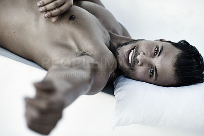 Buy stock photo Rest, portrait of happy man on bed and head on pillow in bedroom for comfort at his home. Shirtless or topless person, confidence and smiling or strong male model relaxing in a white background.