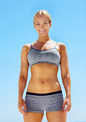 Buy stock photo Portrait of a beautiful blond woman in sportswear standing outside