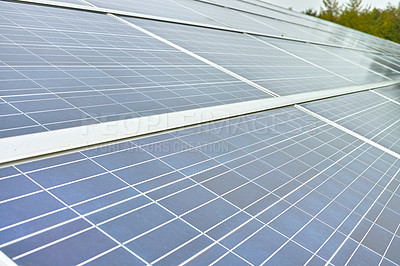 Buy stock photo Solar power installation cell panels are a renewable sustainable energy source. Blue solar panels in Denmark. Photovoltaic generating electricity in electric stations, alternative energy from nature