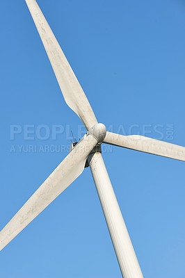 Buy stock photo Windmill, clean energy and nature by blue sky for sustainability with eco friendly power source. Wind turbine, blades and infrastructure to supplement supply grid for renewable electricity in Denmark