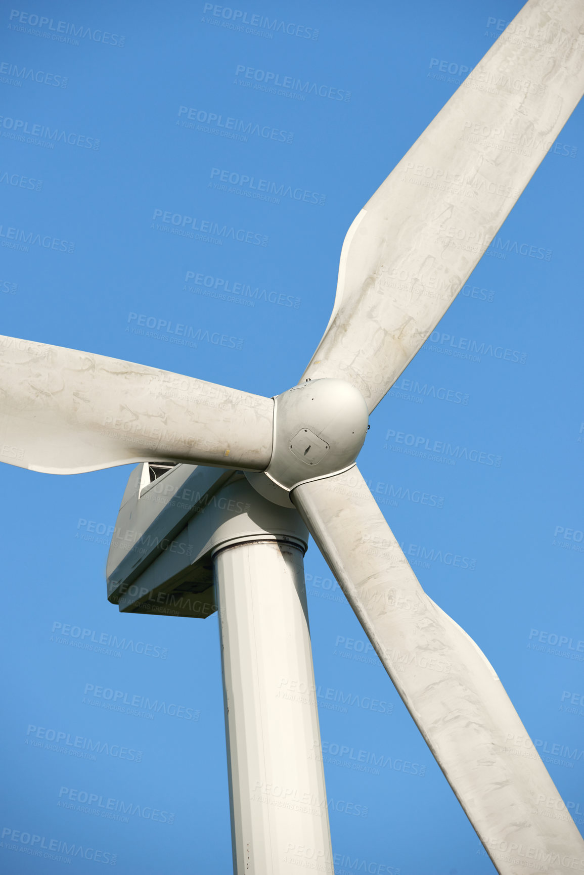 Buy stock photo Windmill, renewable energy and nature by blue sky for sustainability with eco friendly power source. Wind turbine, blades and infrastructure to supplement supply grid for clean electricity in Denmark