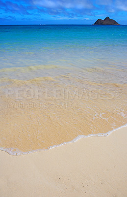 Buy stock photo Hawaii, beach and sea water for holiday, travel and in summer vacation at Lanikai. Ocean, location and sand on coast with blue sky, nature and clouds on horizon with waves on island outdoor in Kailua