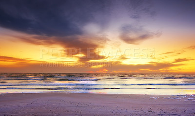 Buy stock photo Nature, sky and sunset at beach with clouds in season for summer holiday, travel or vacation. Earth, sand and sea with horizon on ocean for background, environment or tropical island reflection