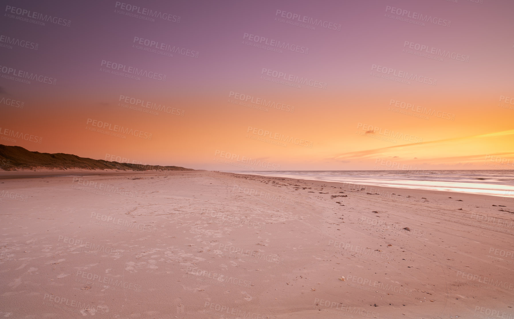 Buy stock photo Sand, landscape or coast at sea at sunset with calm, peace or zen background for holiday, travel or vacation. Horizon, sky or view of ocean, nature or beach in Denmark for break, paradise and trip