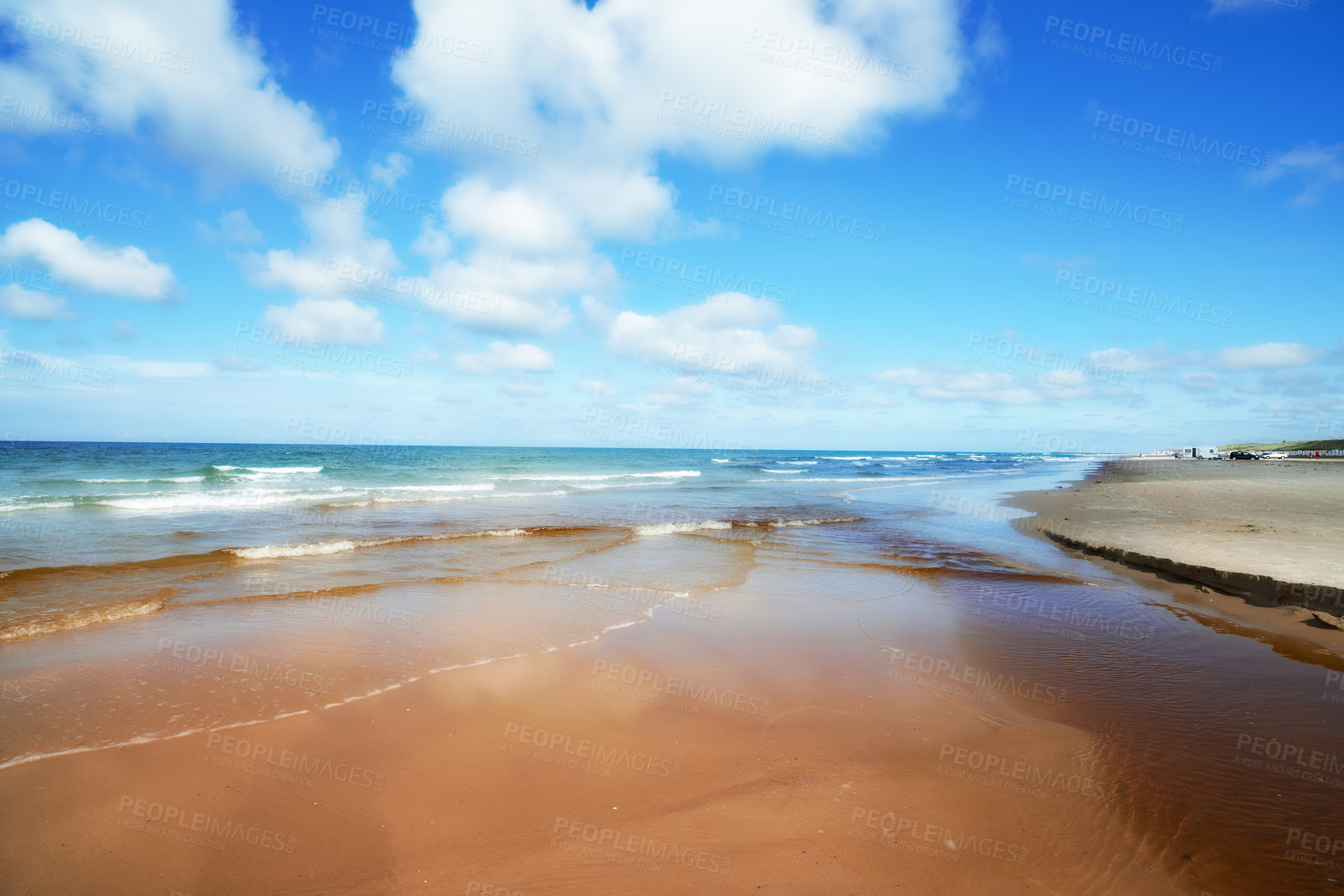 Buy stock photo Blue, sand and water on beach in summer with calm, peace or zen outdoor for holiday, travel or vacation. Earth, nature and tide with view of ocean or sea in Denmark for climate, seashore or trip