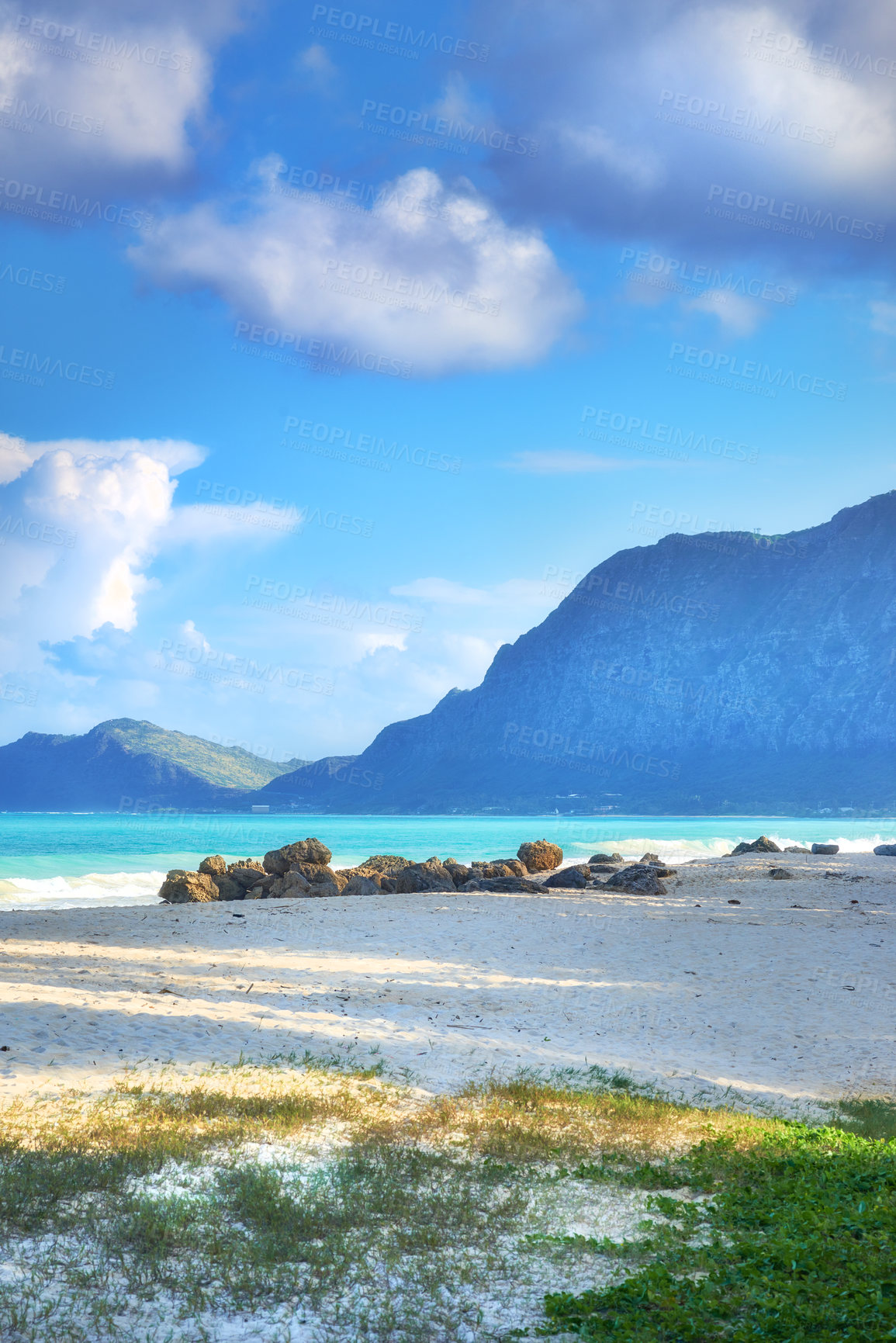 Buy stock photo Mountain, sea or water with sky, grass or ocean in nature or environment with sand or travel destination. Horizon view, park or paradise in natural background, holiday location or beach in Hawaii 