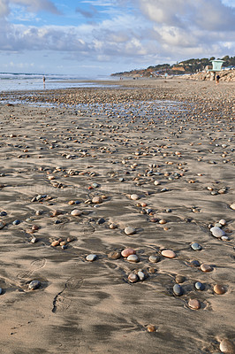 Buy stock photo Travel, sand and coast of beach with stones or rocks on shore, tropical getaway and scenic environment for journey. Adventure, weekend outdoor and holiday trip for summer vacation in California.