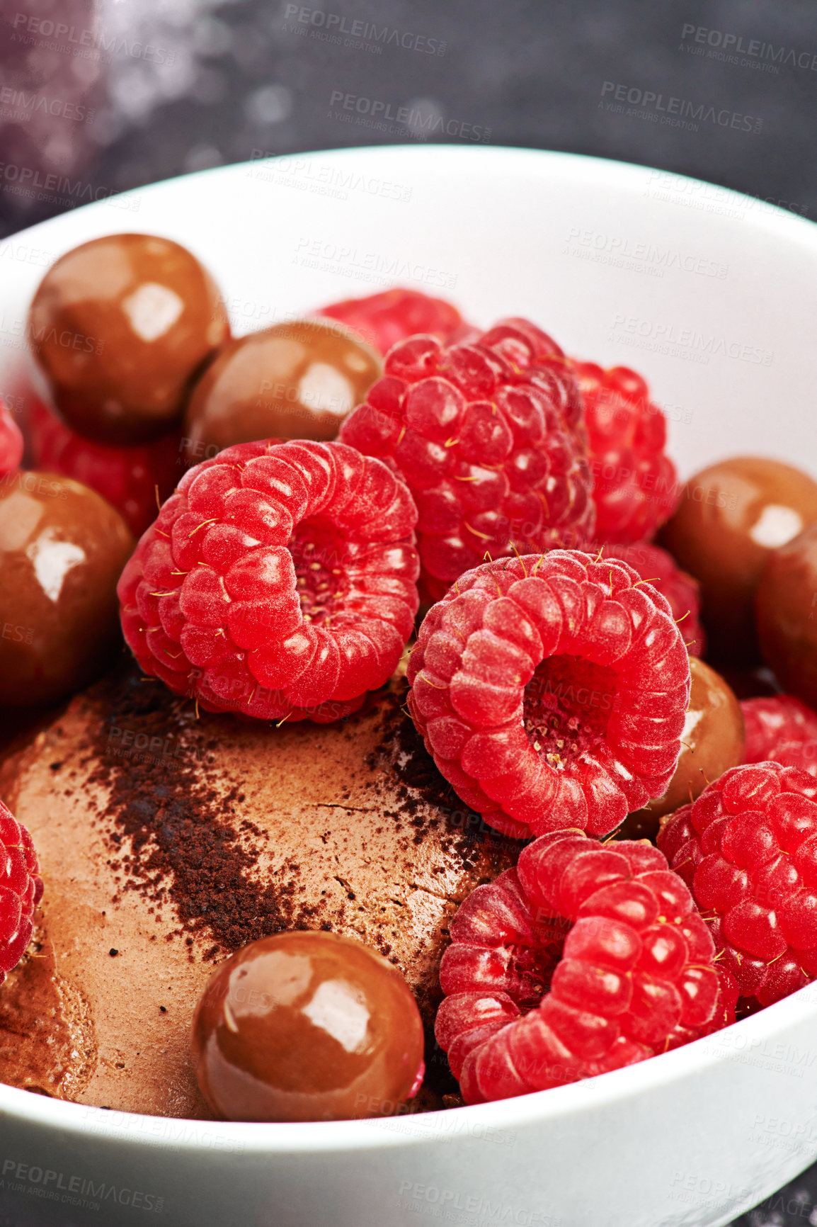 Buy stock photo Desert, fruit and chocolate in bakery for eating, health and wellness isolated in kitchen for enjoyment. Sweet treat, pastry filling and raspberry with cocoa for eating, sugar and vitamin intake.