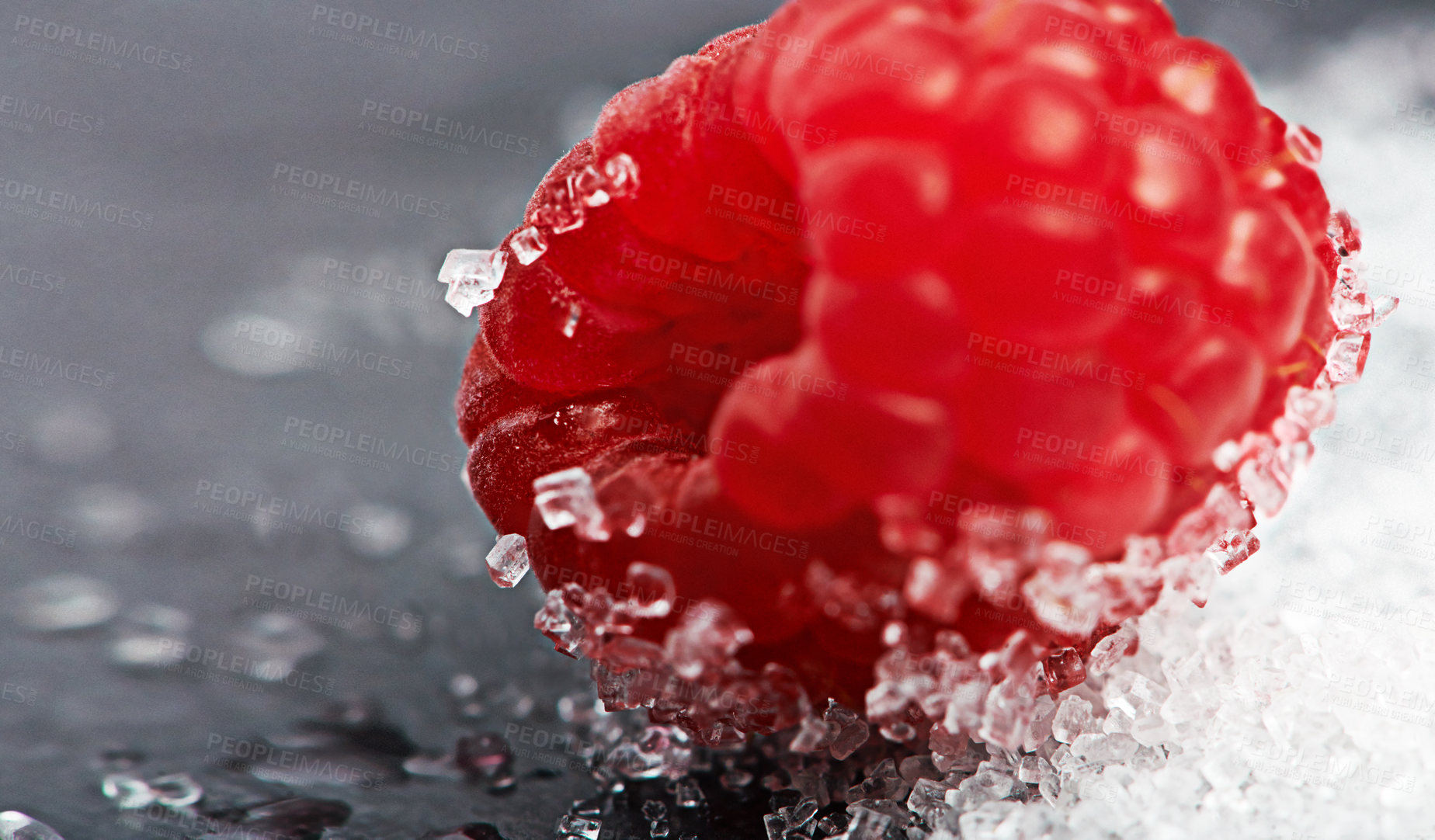 Buy stock photo Closeup, health or raspberry on sugar in kitchen of home on counter for diet, natural vitamin c or nutrition. Vegan, background or fruit on sweet surface in apartment or house for detox or minerals