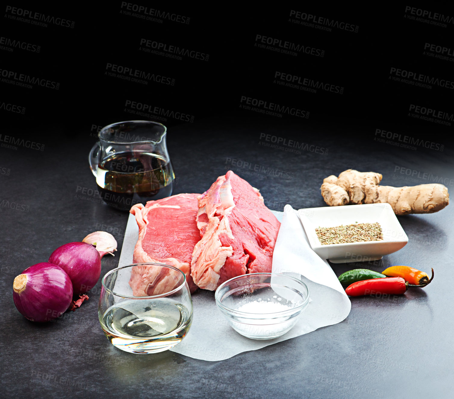 Buy stock photo Organic, healthy and food in beef, cut and spices in studio with dark background. Nutrition, steak and recipe for wellness, health and cuisine with fresh, ingredients for cooking or meal preparation