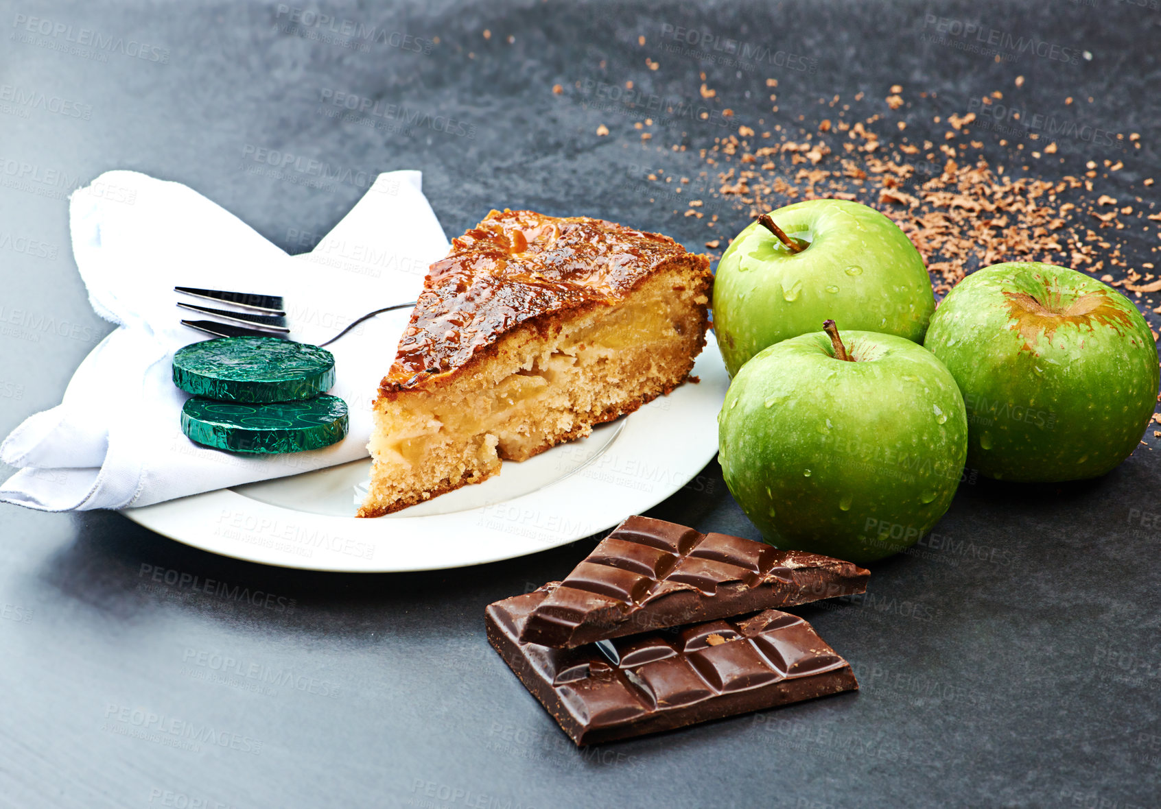 Buy stock photo Apple pie, dark chocolate or baked goods in studio for delicious snack, balanced diet and sweet tasty treat. Fruit, pastry and candy for dessert, nutrition or fresh and healthy meal on countertop