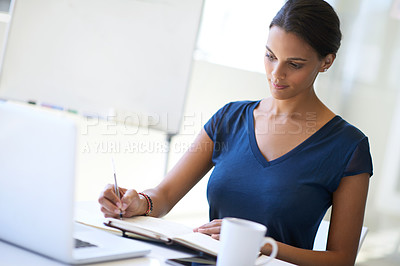 Buy stock photo Cropped shot of an attractive businesswoman at work in an office