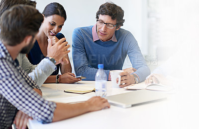Buy stock photo Cropped shot of colleagues in a business meeting