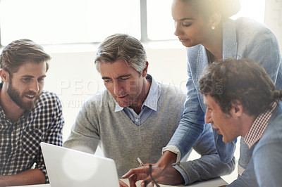 Buy stock photo Cropped shot of colleagues in a business meeting
