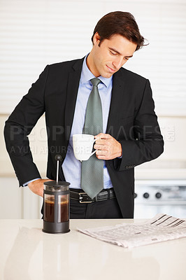 Buy stock photo Business man, reading newspaper and coffee in kitchen with thinking, ideas or check stats on global market. Trader, investor and morning paper for announcement, stock and decision for financial job