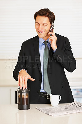 Buy stock photo Happy businessman, phone call and coffee for morning discussion or communication in kitchen at home. Man or employee smile and talking on mobile smartphone for conversation or caffeine drink at house