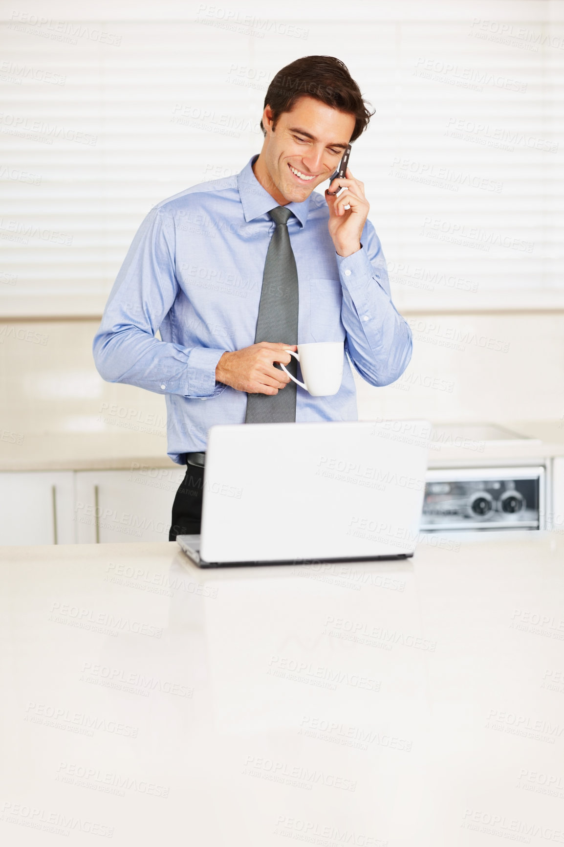 Buy stock photo Happy businessman, phone call and coffee for conversation or communication in kitchen at home. Man or employee smile and talking on mobile smartphone for morning discussion with cup of tea at house