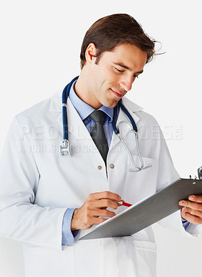 Buy stock photo Man, doctor and writing on clipboard for prescription, appointment or checklist against a white studio background. Male person, surgeon or medical professional smile with notes or life insurance