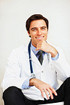 Happy young male doctor with stethoscope