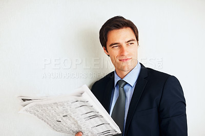 Buy stock photo Business man, reading newspaper and wall for thinking, idea or economy to check stats on global market. Trader, investor or happy for revenue announcement in morning for stock, decision and finance