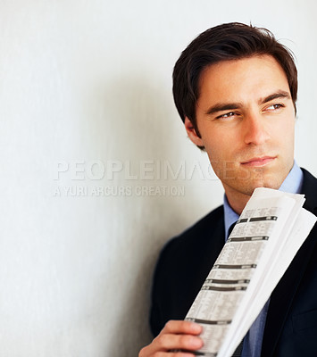 Buy stock photo Business man, newspaper and wall for thinking, space or mockup for economy, check stats or global market. Trader, investor or happy for revenue announcement in morning for stock, decision or finance