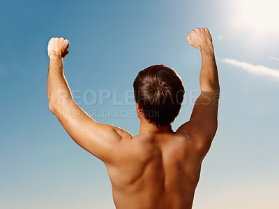 Buy stock photo Back, hands raised and a shirtless man on a blue sky with flare for fresh air in summer during vacation. Freedom, fitness and winner with the body of a strong, healthy person outdoor for wellness