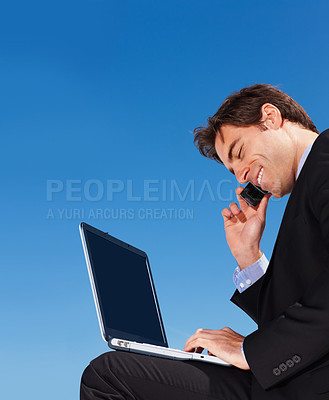 Buy stock photo Laptop, phone call and happy business man in conversation, listening or communication on blue sky mockup space. Computer, mobile chat and lawyer networking, discussion or legal advice on smartphone