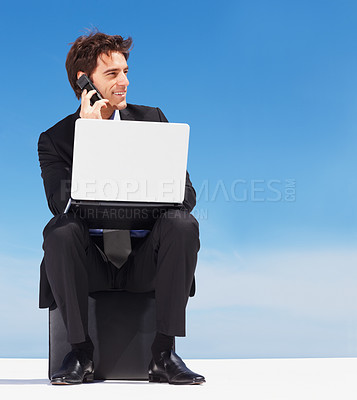 Buy stock photo Laptop, phone call and smile of business man on briefcase in conversation, listen or communication on blue sky mockup for remote work. Computer, mobile chat or lawyer consulting, discussion or think