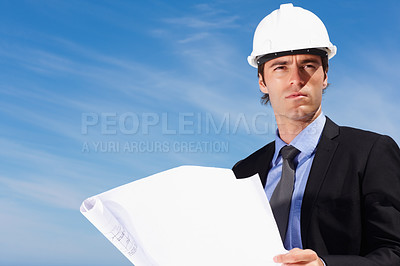 Buy stock photo Industry, blueprint and  construction worker thinking by blue sky on building rooftop for planning. Engineering, professional and male industrial employee with architecture drawing for project.