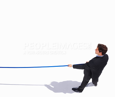 Buy stock photo Businessman, rope and tug of war by white background, career challenge and manager power struggle. Young person, mental health and professional worker in suit, top view and workplace battle in studio