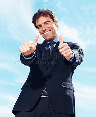 Buy stock photo Business man, thumbs up and happy for success, support or like emoji, portrait and blue sky background in real estate. Excited realtor, corporate businessman or agent with good job, okay or yes hand