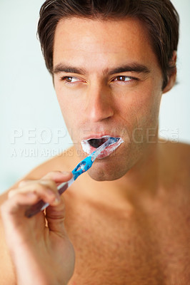 Buy stock photo Bathroom, brushing teeth and man with thinking, dental hygiene and grooming routine for fresh breath. Person, home or guy with toothbrush, cleaning his mouth and morning with oral health or wellness