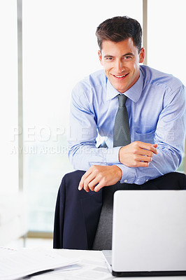 Buy stock photo Businessman, portrait and laptop at office desk with financial paperwork for investment report, review or loan. Male person, face and smile for economy growth or accounting, corporate or research