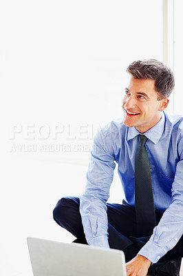 Buy stock photo Businessman, laptop and smile in office for work in corporate company for online emails with technology. Law clerk, firm and worker or entrepreneur with suit for professional attourney in London