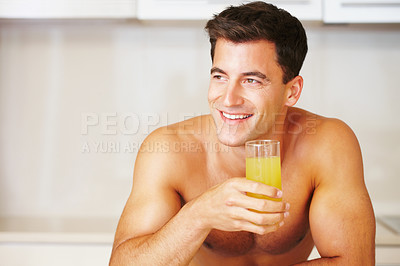 Buy stock photo Happy man, smile and hold for juice in kitchen for delicious, nutrition and liquid breakfast for balanced diet. Male person, face and excited for fresh, organic and orange beverage for healthy drink