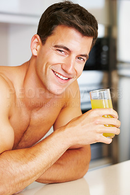 Buy stock photo Portrait, smile and man in a kitchen, orange juice and healthy with wellness, morning and diet plan. Face, bare and person with glass, guy and home with natural drink nutrition and happiness with joy