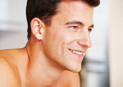 Buy stock photo Face, thinking and skincare of happy man in home, dream and vision for health or wellness. Smile, beauty idea and cosmetics of young male person, facial treatment and aesthetic or natural skin glow