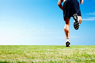 Buy stock photo Cropped image of a young guy jogging against the sky - Copyspace
