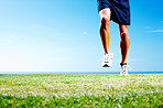 Young man running against the sky - Outdoor