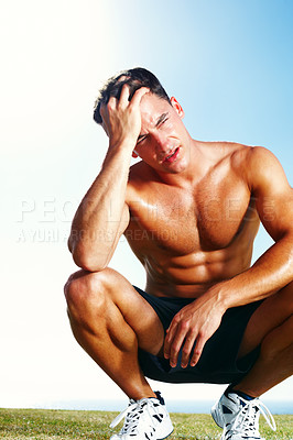 Buy stock photo Portrait of a tired young man resting after jogging against sky - Copyspace
